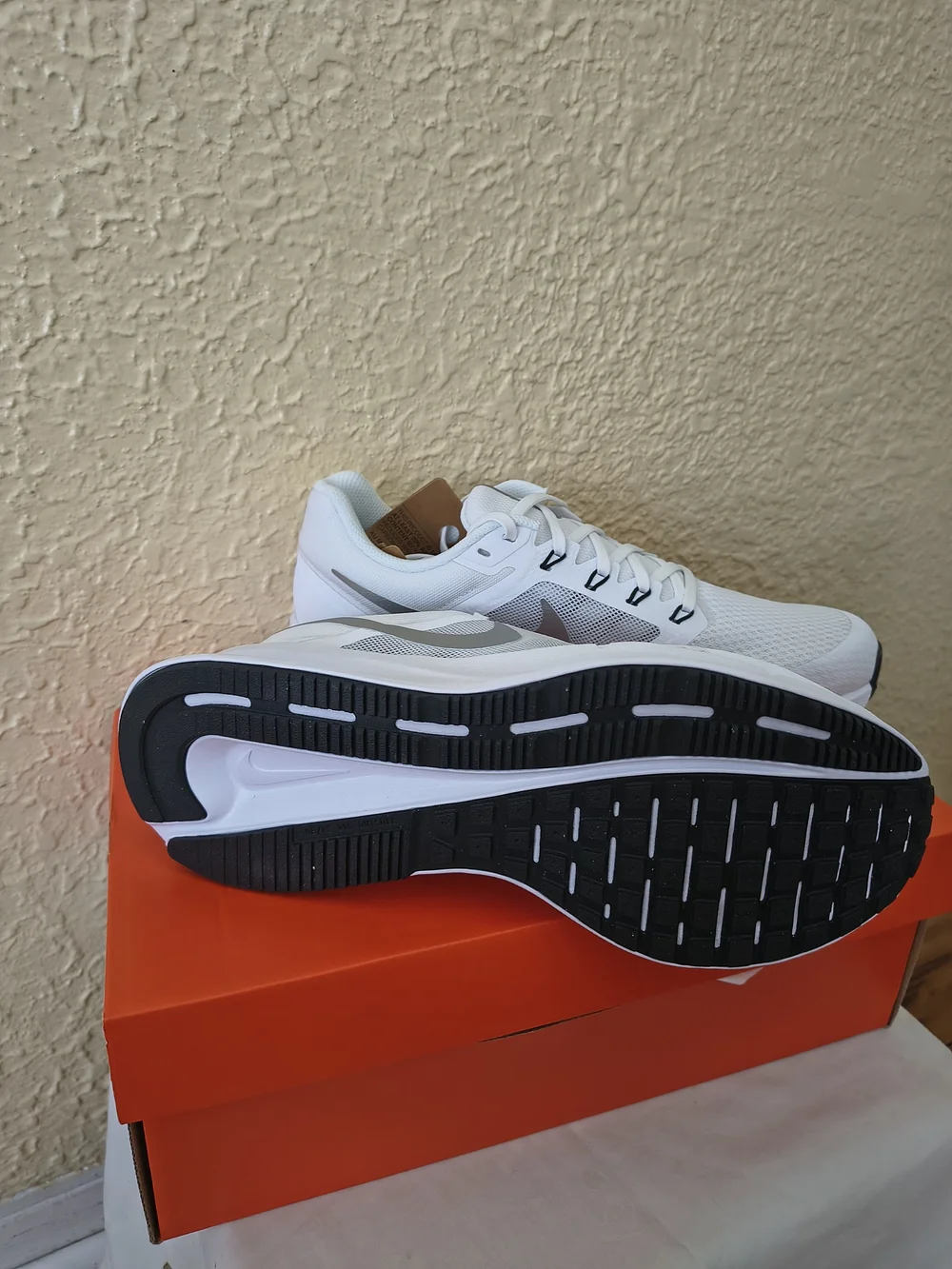 Nike Women’s White Sneakers with Silver Swoosh